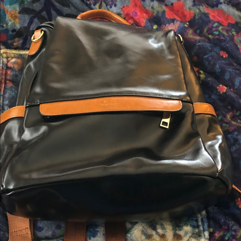 Leather-Trim Black Backpack with Tan Accents